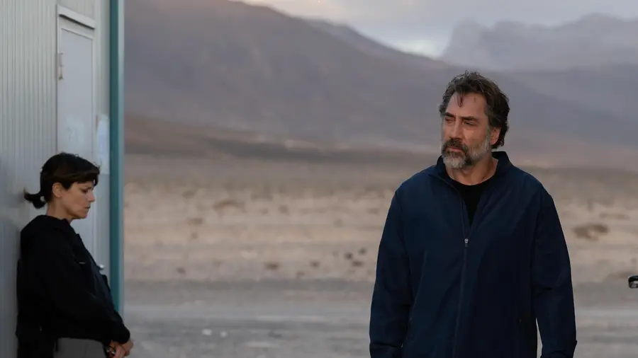 The Beloved still: Javier Bardem and Victoria Luengo in a desert landscape
